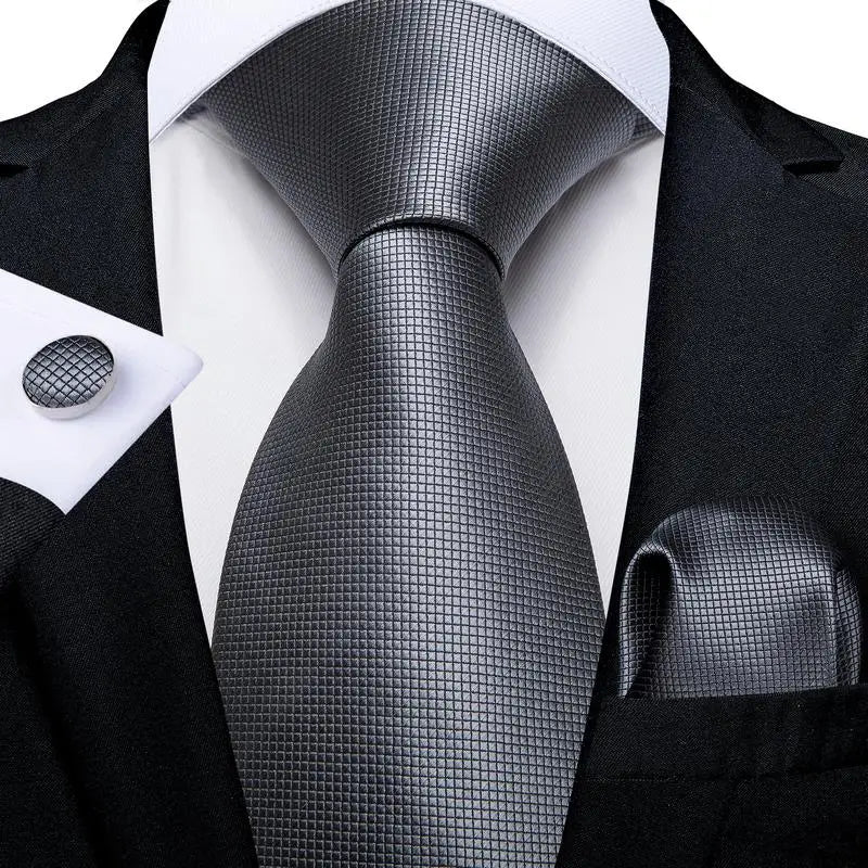 plain gray textured tie with cuff links and pocket square