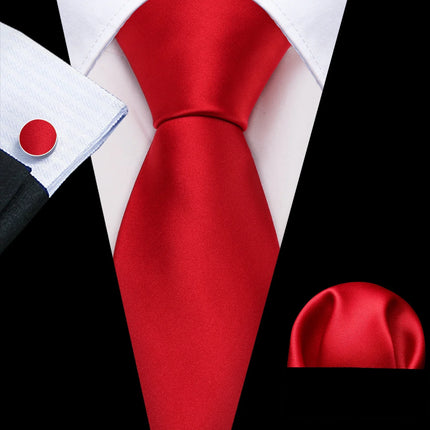 red ties with matching cuff links and pocket square