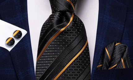 Black and Gold Striped Tie made from jacquard woven silk. Includes Matching Cuff Links and Pocket Square