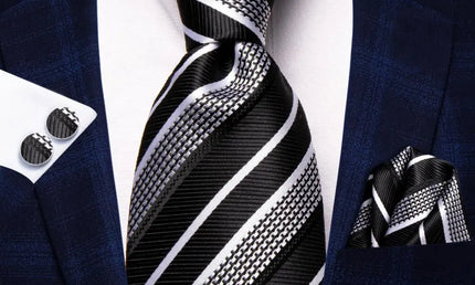 Black and White Striped Tie made from jacquard woven silk. Includes Matching Cuff Links and Pocket Square