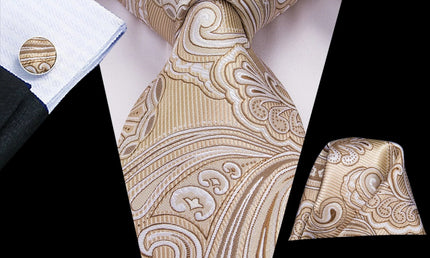 beige paisley tie with cuff links and pocket square