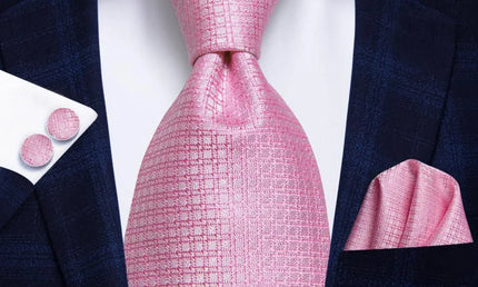 pink geometric design silk tie with matching cuff links and pocket square