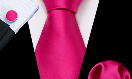 plain bright pink tie with cuff links and pocket square