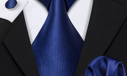 plain dark blue textured tie with cuff links and pocket square