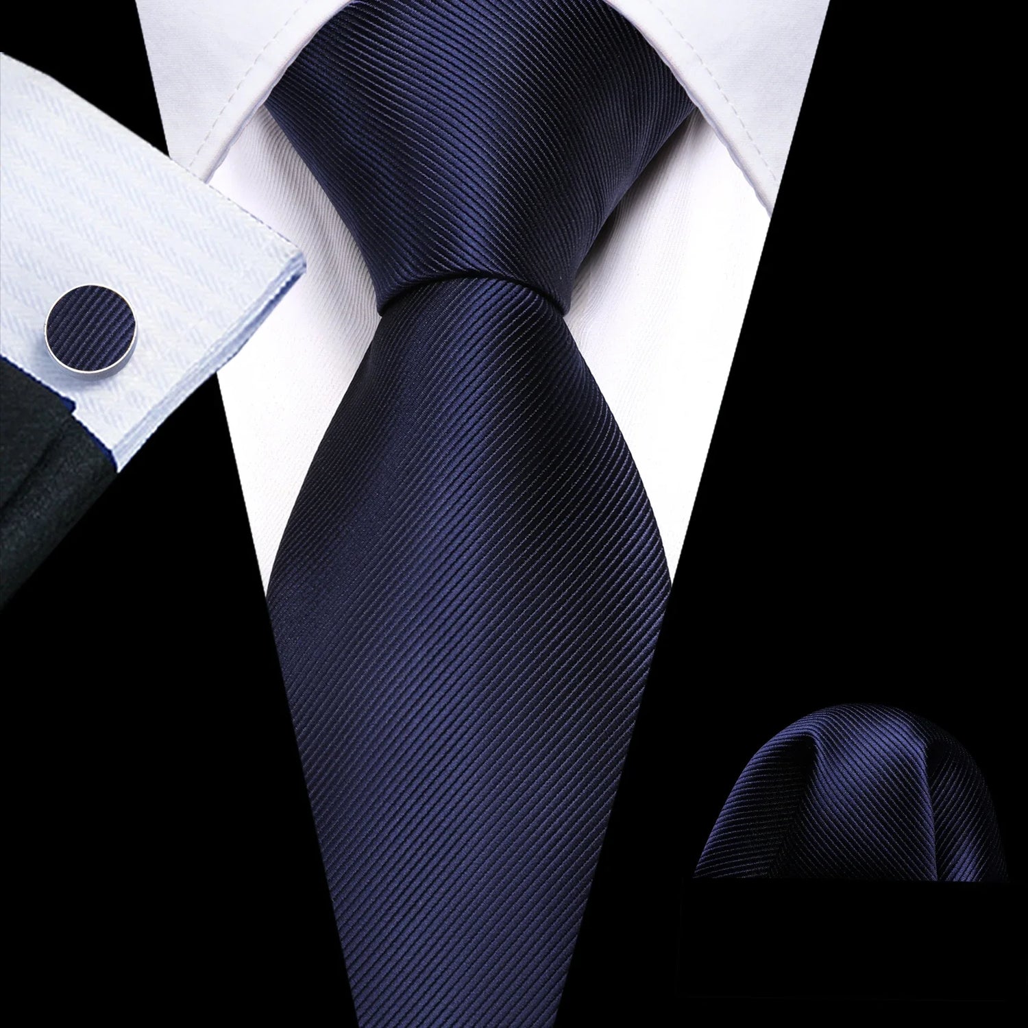 plain dark blue tie with matching cuff links and pocket square