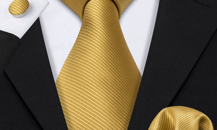 plain gold textured tie with cuff links and pocket square
