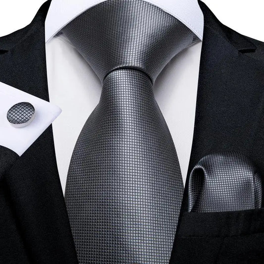 plain gray textured tie with cuff links and pocket square