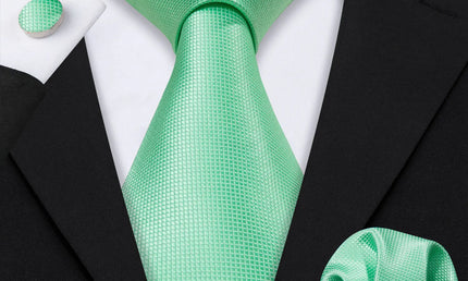 plain light green textured tie with cuff links and pocket square