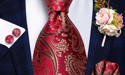 red paisley silk tie with matching cuff links and pocket square
